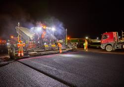 The asphalt pavers use one or two Trimble MT900 Machine Targets depending on their position in the paver setup and are guided in 3D by the Trimble PCS900 Paving Control System and Trimble SPS930 Universal Total Stations -Photo La Compagnie Générale de Photographie 