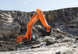 An Hitachi ZX690-7 crawler excavator at work in a quarry