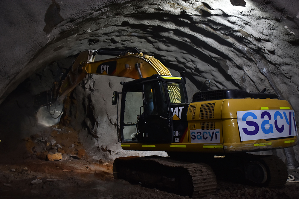 Water spraying has been employed while using the hydraulic breaker to minimise dust levels - image courtesy of Sacyr/Unión Vial Río Pamplonita 